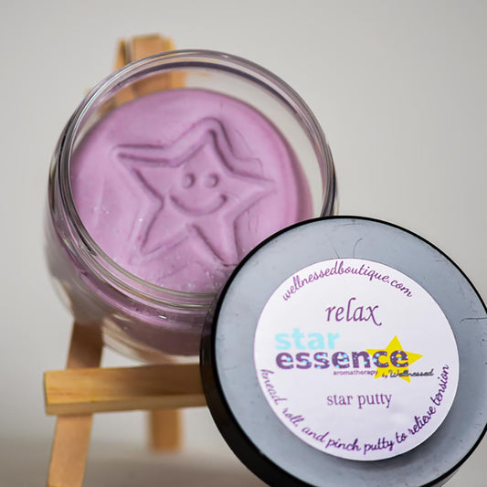 Star Essence Relax Aromatherapy Putty putty in a clear jar with a label on a white background