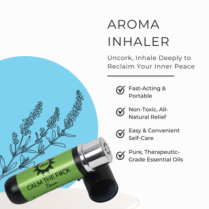 Calm Down aroma inhaler with a green body and black cap, shown on a white background with text describing benefits and a blue circle with line art of lavender branches. The product label reads 'CALM THE F*CK Down.