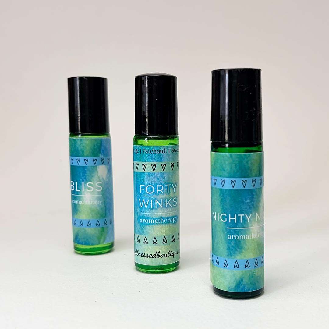 Set of three essential oil roll on bottles with Forty Winks sleep essential oil blend in the center