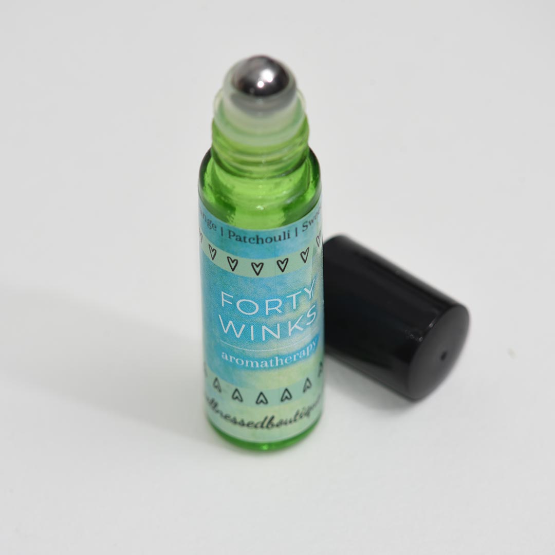 Wild Orange, Patchouli, Neroli, and Sweet Marjoram Essential Oil Forty Winks Rollerball Blend for sleep