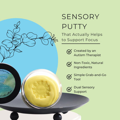 A jar of Getting Shit Done sensory putty sits on a black display stand against a light green background with a blue decorative circle and text describing the product benefits. Part of the lid is visible on the left.