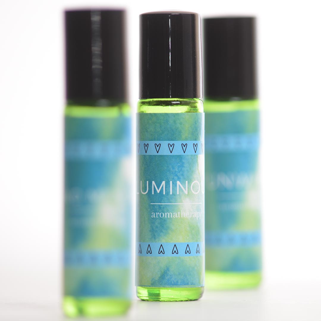Luminious Rollerball with Sandalwood, Vetiver, and Patchouli Essential Oils